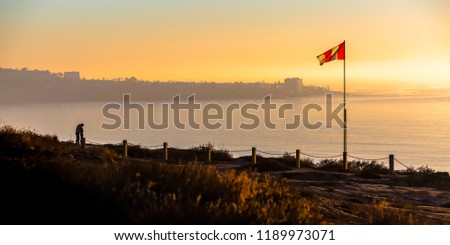 Blacks Beach overlooking Pacific Ocean at sunset