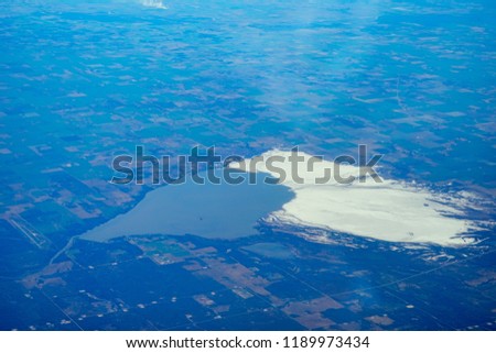 Aerial view of farm and Mississippi river in the middle plain of USA