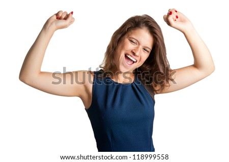 Young brunette smiling with her arms up in the air, isolated in a white background
