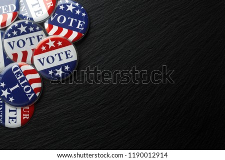 Red, white, and blue vote buttons background Royalty-Free Stock Photo #1190012914