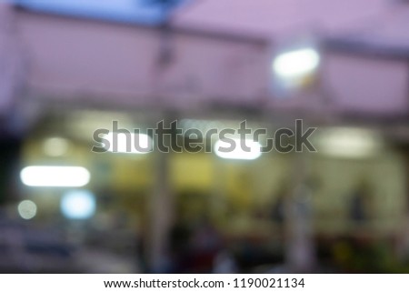 Bright blurred ligh lamp in town night time background 