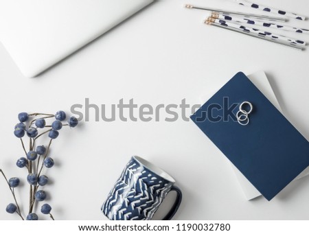 Navy blue and silver styled feminine office and desktop stock photos.
