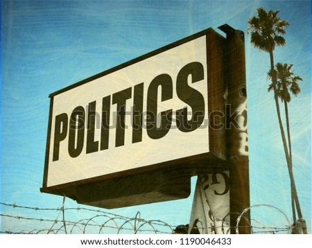  aged and worn politics sign with palm trees                              