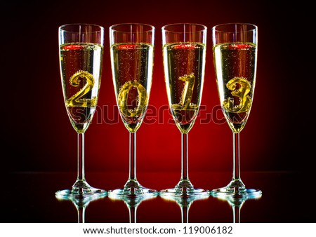 four glass goblet with champagne and  numeral 2013,  beautiful celebrations  New Year concept photo