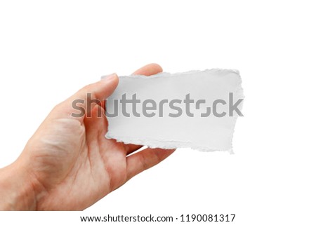 Hands holding a small piece of paper. Close up. Isolated on white background