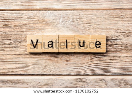 value word written on wood block. value text on table, concept.