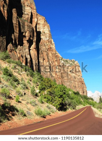 The famous red road to Zion National Park, the amazing american national park located in southwestern Utah near the city of Springdale 