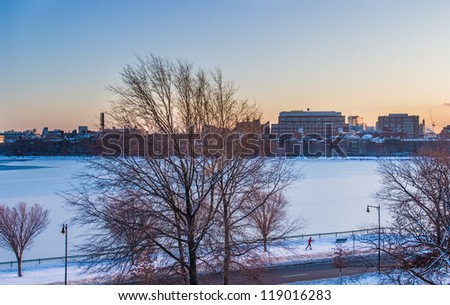 Boston's Charles River frozen with cross-country skiier