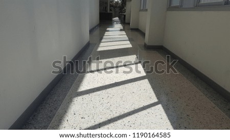 Pictures of light and shadow through the windows in the corridor.