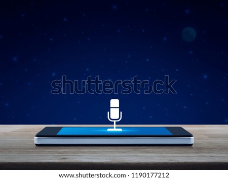 Microphone flat icon on modern smart mobile phone screen on wooden table over fantasy night sky and moon, Business communication online concept
