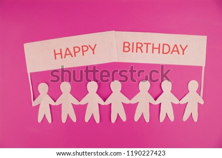 paper People Holding a Colorful Happy Birthday sign