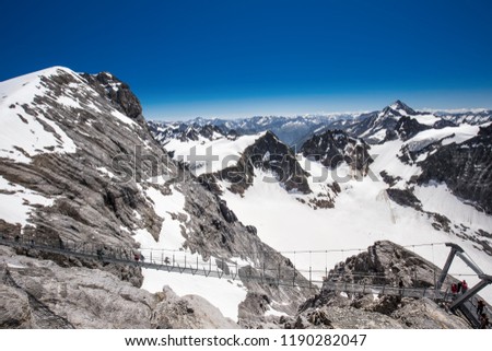 Titlis cliff walk with the view of Swiss Alps, Switzerland, Europe. 