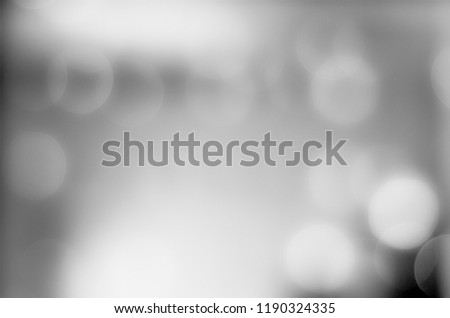 Soft bokeh background. Luminous garlands of electric lights. Copy space to add text. Blurry abstraction.Dark night. Festive party in city. Defocus effect.