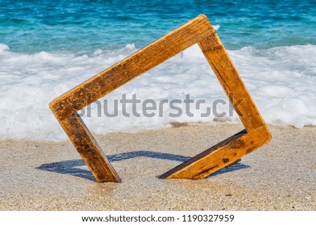 wooden picture frame at sea