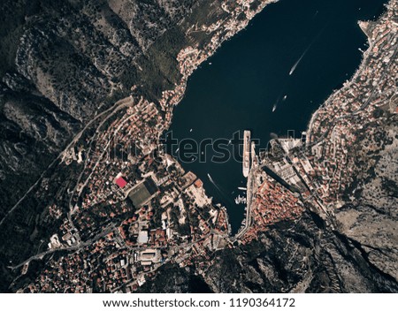 Montenegro. Boka Bay of Kotor. The Town Of Kotor. The view from the top. Liner in the port of Kotor. View of the old town Kotor. Photography with drone.