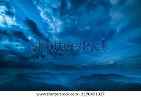 The beautiful mountain view on the background of the sky. evening night time
