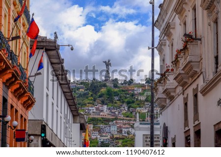 Colourful streets of Quito with El Panecillo and the Virgin Mary in the Background Royalty-Free Stock Photo #1190407612