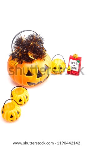 Plastic jack-o-lantern trick or treat on white background With empty space available for Text