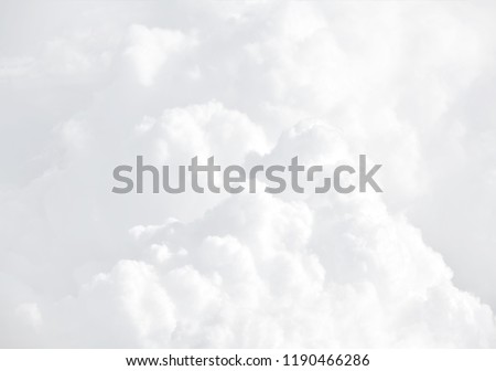 Sky with clouds, a view from an aeroplane above the clouds. Abstract nature background with clouds in light tonality. White cumulus clouds Royalty-Free Stock Photo #1190466286