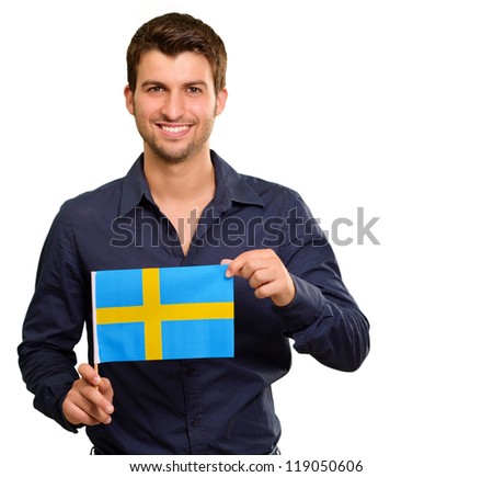 Portrait of a man holding flag on white background