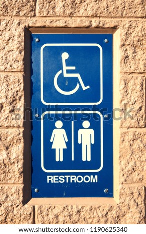 Restroom sign in texture background