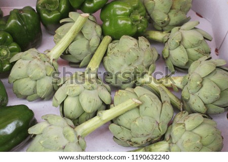 artichokes and peppers in the market