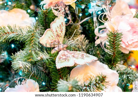 Closeup on Christmas tree decoration over festive background