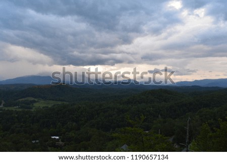 Cloudy forest mountains