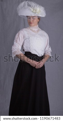 Edwardian lady in white lace blouse