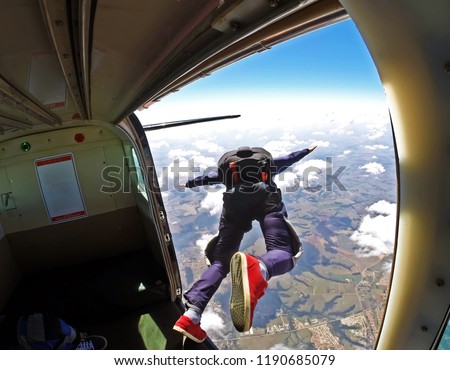 Skydiver jump out of plane Royalty-Free Stock Photo #1190685079