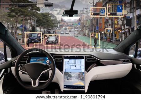 Autonomous car with HUD (Head Up Display). Self-driving vehicle on city street Royalty-Free Stock Photo #1190801794