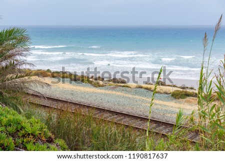 A view of Pacific ocean from San Diego beach with rail track, southern California