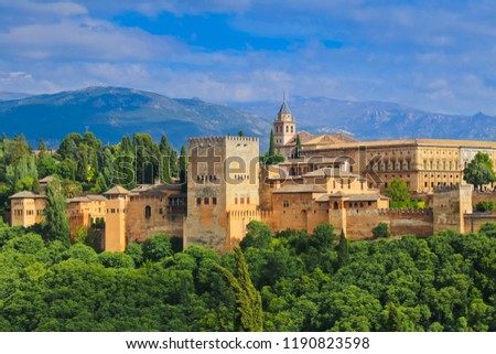 Granada, Spain. Aerial view of Alhambra Palace in Granada, Spain with Sierra Nevada mountains at the background. 