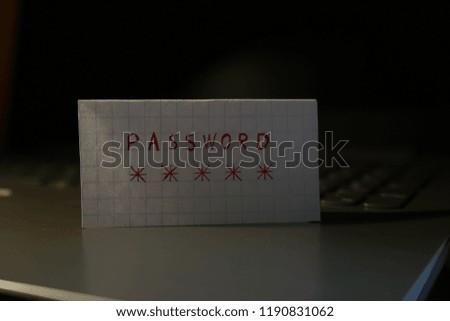 Password concept on sheet, laptop background