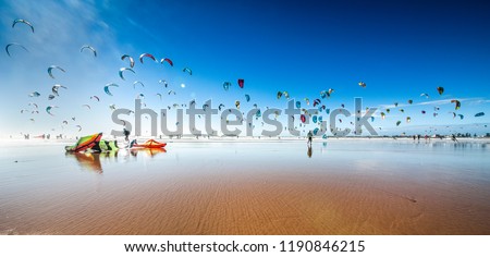 Kite surfing at Essaouira Beach, Morocco Royalty-Free Stock Photo #1190846215