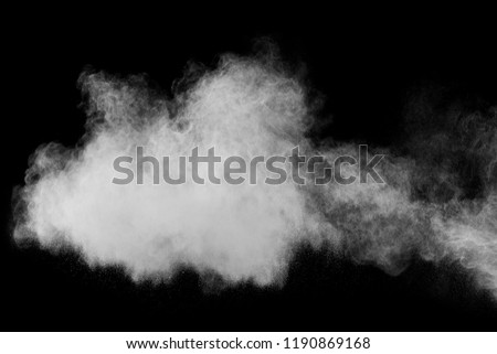abstract powder splatter on black background. Freeze motion of color powder explode. color powder splash