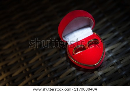 Wedding ring gold in a red love heart box