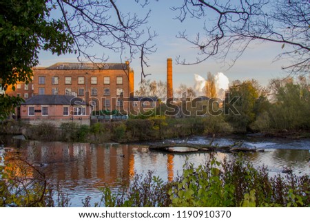 Beautiful Architecture of the Darley Abbey Mills with stunning Derwent river view in Derby, UK Royalty-Free Stock Photo #1190910370