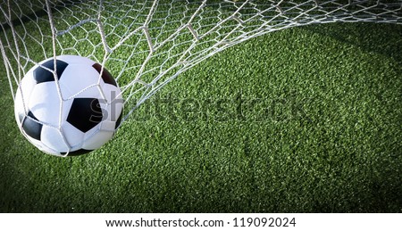 Soccer ball in goal, success concept Royalty-Free Stock Photo #119092024