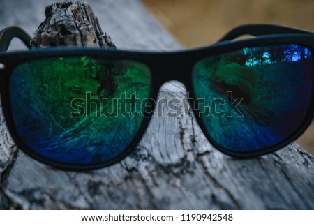 sunglasses with an iridescent lens