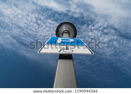 Street lamp and parking sign in Switzerland