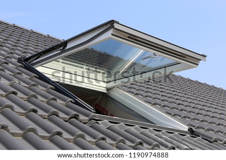 Skylight on a residential home, exterior shot Royalty-Free Stock Photo #1190974888