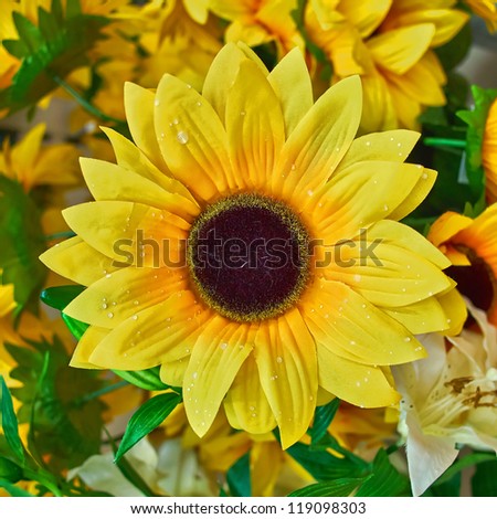 fake sunflower closeup, floral background
