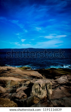 a beautiful landscape view with the ocean and rocks and waves inside a national park in America while traveling 