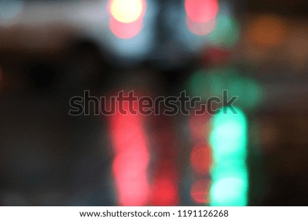 Defocused car lights in the evening traffic jam