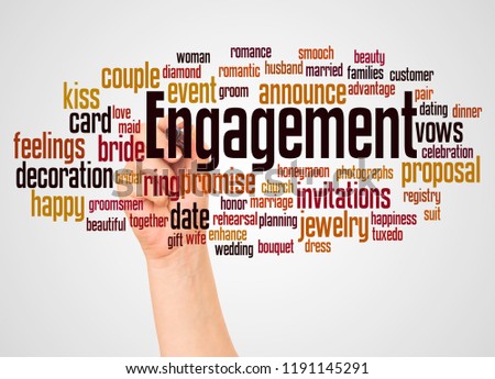 Engagement word cloud and hand with marker concept on white background.
