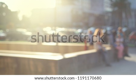 Abstract street city light blur blinking background. Soft focus. Group of people.