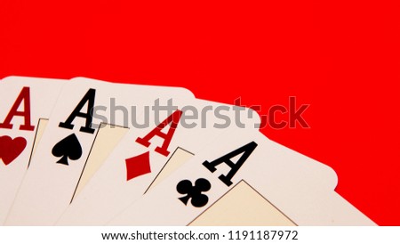 playing cards showing a four ACEs