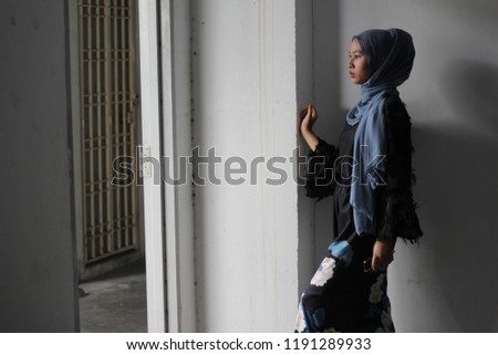Asian girl wearing hijab at outdoor photoshoot session 