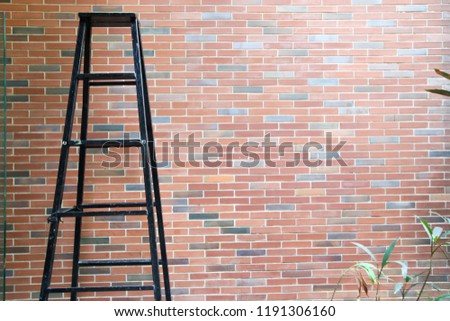 Stairs on brick wall
